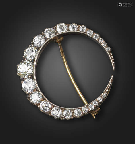 A Victorian diamond-set closed crescent brooch, set with graduated old circular-cut diamonds in