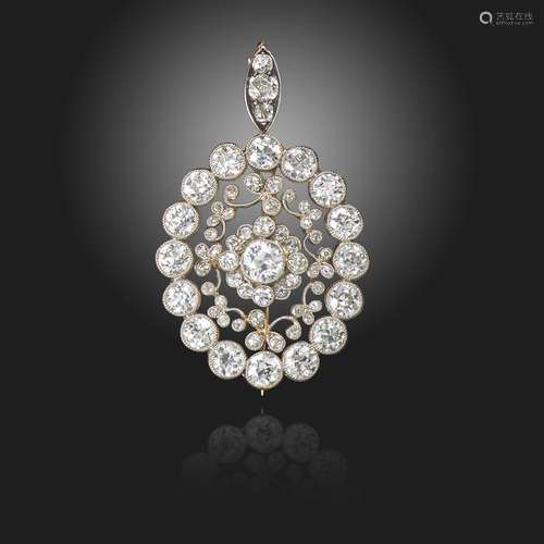 An Edwardian diamond-set brooch pendant, centred with a cluster of old circular-cut diamonds, within