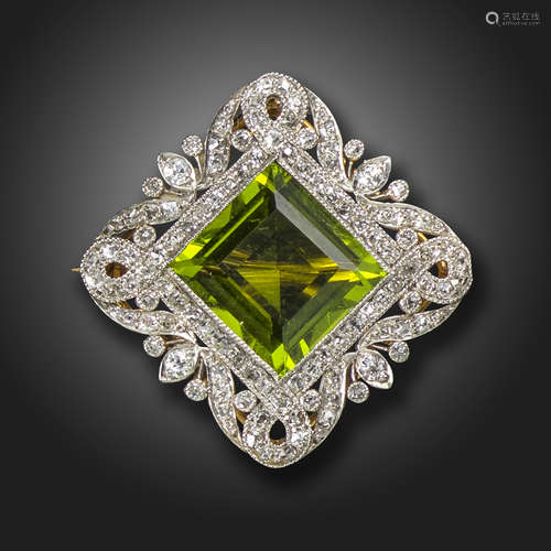 An Edwardian peridot and diamond brooch, of quatrefoil design, centred with a square-shaped