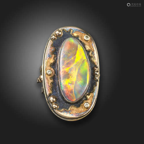 A Russian diamond and opal-set ring, of abstract design, set with round brilliant-cut diamonds and