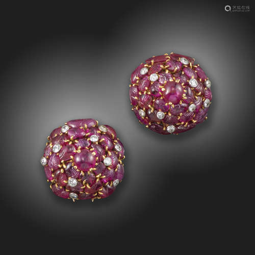 A pair of carved ruby bombe earrings by Henri Lavabre, c.1925, the carved ruby leaves are