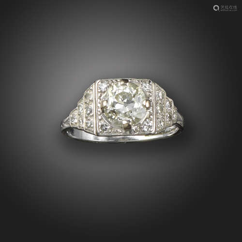 An Art Deco diamond solitaire ring, the old circular-cut diamond is set within a square surround