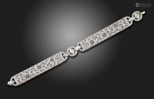 A diamond and gem-set platinum bracelet, centred with three marquise-shaped diamonds, the