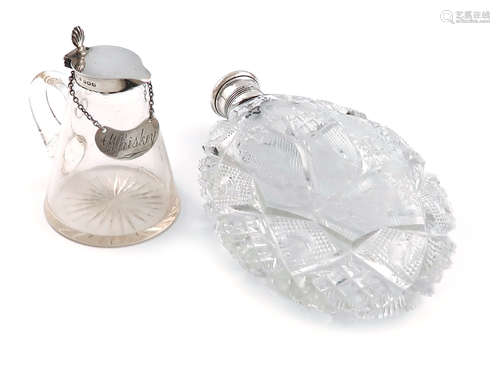 An American silver-mounted glass spirit flask, by Gorham, 1879, oval form, hob-nail cut and engraved