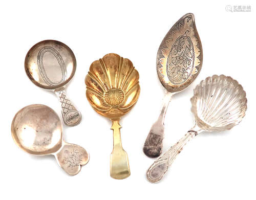 A collection of five antique silver caddy spoons, various dates and makers, including: a George