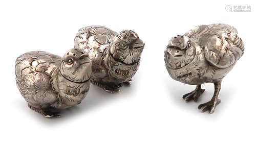 A three-piece novelty silver chick pepper pots, by Neresheimer of Hanau, with import marks for 1925,