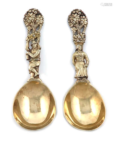 A pair of Victorian cast silver-gilt caddy spoons, by Francis Higgins, London 1862, oval bowls, cast