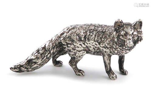 A silver model of a fox, by Grey and Co., Chester 1930, modelled in a standing position, length 11.