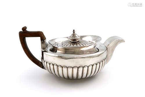 A George III Scottish silver teapot, maker's mark possibly that of James Dempster, Edinburgh 1802,