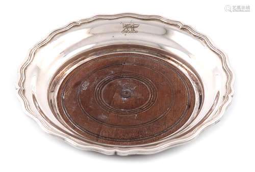 A 19th century Colonial silver wine coaster, marked with pseudo English marks and maker's mark JS