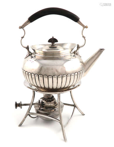 An Edwardian silver kettle on a matched stand, by Heath and Middleton, Birmingham 1907, the stand