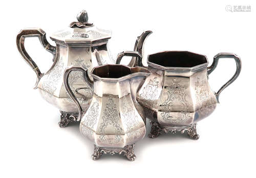 λA three-piece Victorian silver tea set, by George Angell, London 1850/51, panelled baluster form,