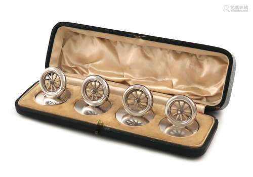 A set of four Edwardian novelty silver menu card holders, by William Hornby, London 1905, modelled