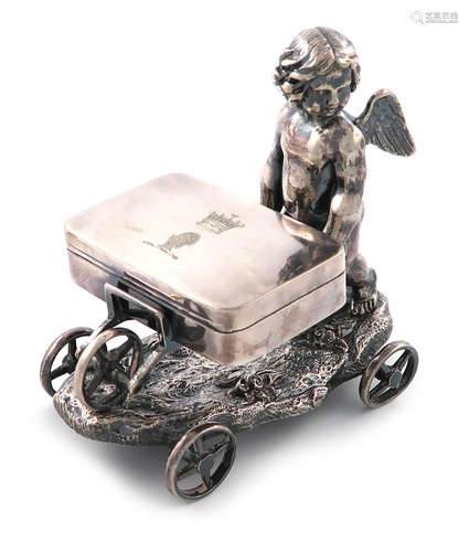 A Victorian novelty electroplated table snuff box, by Elkington 1873, modelled as a cherub pushing a