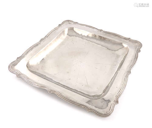 A Columbian metalware serving platter, unmarked, square form, moulded border, length 39.5cm.