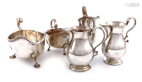 A mixed lot of silver items, various dates and makers, comprising: two cream jugs of 'sparrow-