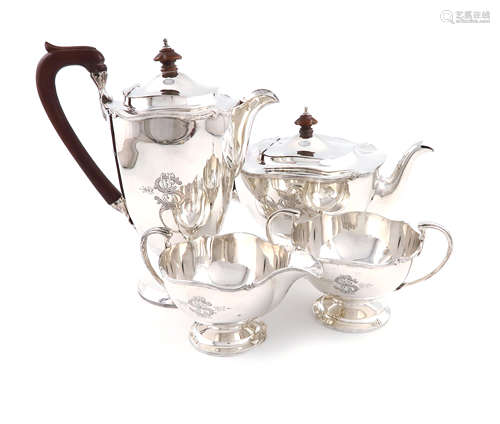 A four-piece silver tea set, by Collingwood & Sons Ltd., Birmingham 1915, circular form, scroll