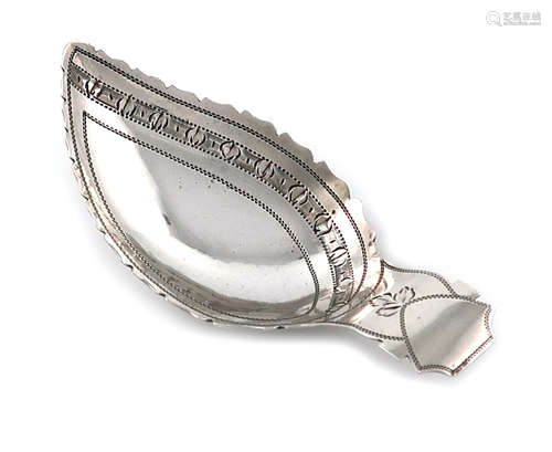 A George III silver caddy spoon, London 1806, leaf form, wavy-edge border, bright-cut decoration,