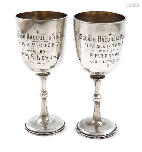 Two late-Victorian silver naval trophy goblets, by George Jackson, London 1891/92, plain urn