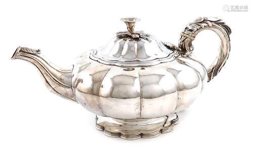 λA William IV presentation silver teapot, by Joseph Angell, London 1830, lobed circular form, the