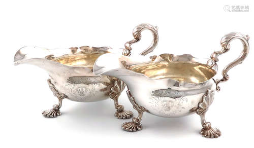 A pair of George II silver sauce boats, by Fuller White, London 1752, oval form, leaf capped