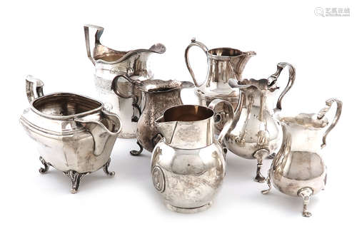 A collection of seven silver cream jugs, various dates and makers, including a George II one, of