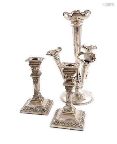 A pair of Edwardian silver candlesticks, by Frederick Highland, London 1905, tapering square form,