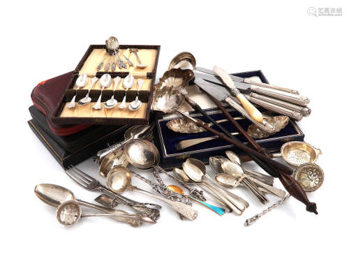 A mixed lot of flatware, comprising silver items: three antique punch ladles, wooden handles, a