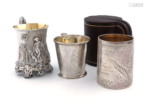 A small collection of three silver christening mugs, comprising: a Victorian one by Creswick &