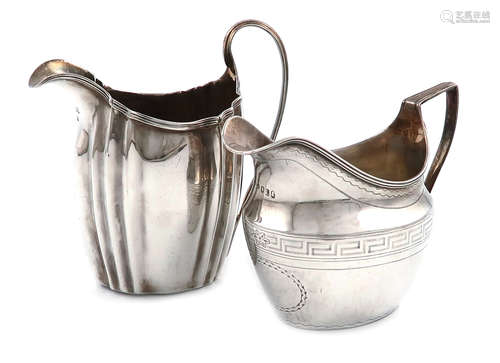 A George III silver cream jug, by Elizabeth Morley, London 1806, oval bellied form, scroll handle,