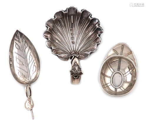 A small collection of three antique silver caddy spoons, comprising: a Victorian one by George