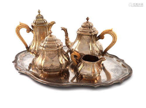 λA 19th century French silver-gilt tea set and tray, by A. Aucoc, Paris circa 1890, lobed square