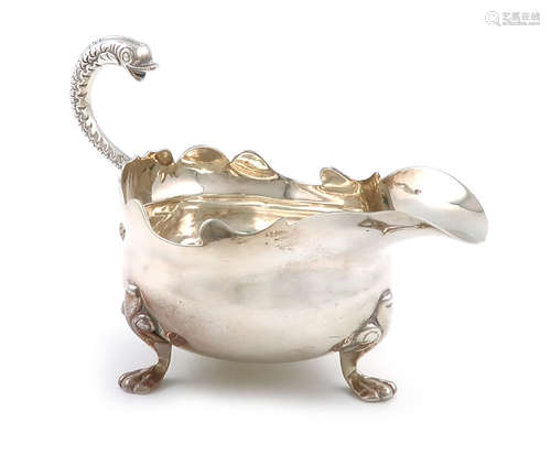 A George II provincial silver cream boat, by Isaac Cookson, Newcastle 1746, oval from, wavy-edge