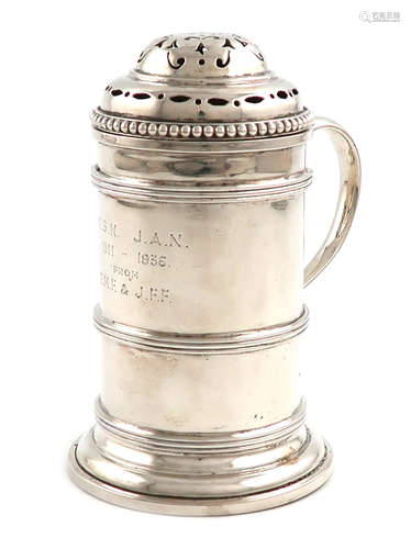 A silver flour shaker, by Fowler & Polglaze Ltd, London 1935, cylindrical form, scroll handle, the