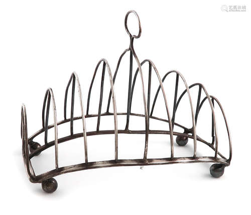 A George III silver nine-bar toast rack, by Peter, Ann and William Bateman, London 1801, rounded