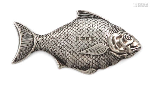 A novelty silver fish caddy spoon, by Thomas Bradbury and Son, Sheffield 1910, with scale