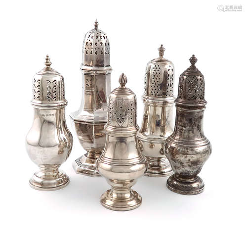 A small collection of five silver casters, comprising: one of octagonal form, by William Adams