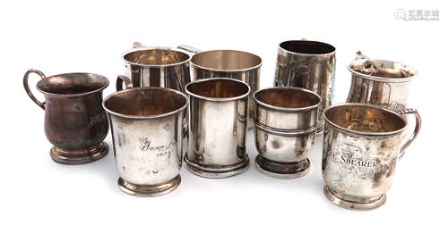 A collection of nine small silver mugs, comprising: one by the Atkin Brothers, Sheffield 1906,