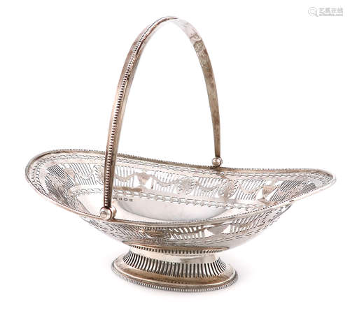 A silver basket, by Elkington and Co., Birmingham 1911, oval form, pierced and engraved with urns,