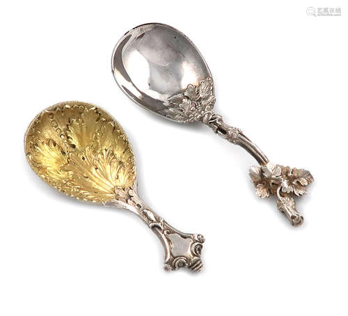 A Victorian cast silver caddy spoon, by George Adams, London 1851, gilded fig-shaped bowl with