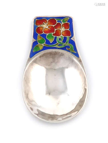 By Bernard Instone, an Arts and Crafts silver and enamel caddy spoon, Birmingham 1928, also