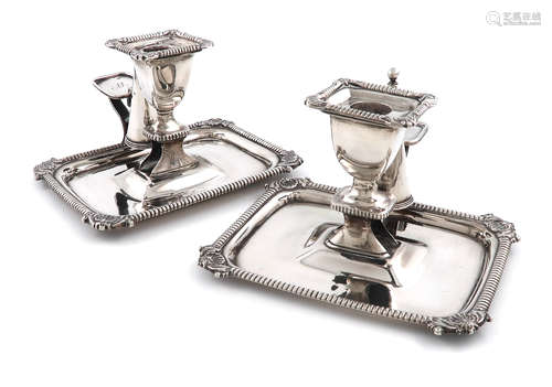 A matched pair of George III silver chamber sticks, by Solomon Hougham, London 1811 and William