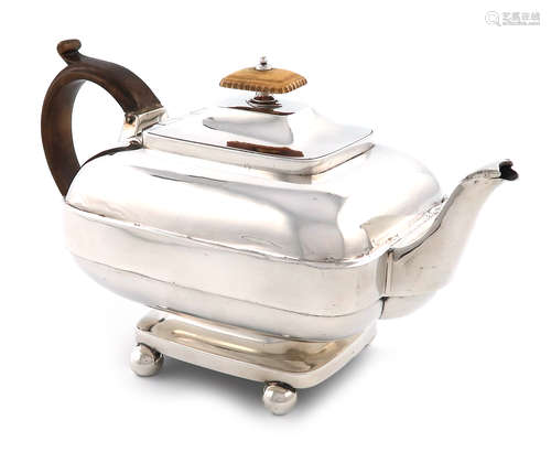 λA George III provincial silver teapot, by Barber and Whitwell, York 1815, rounded rectangular form,