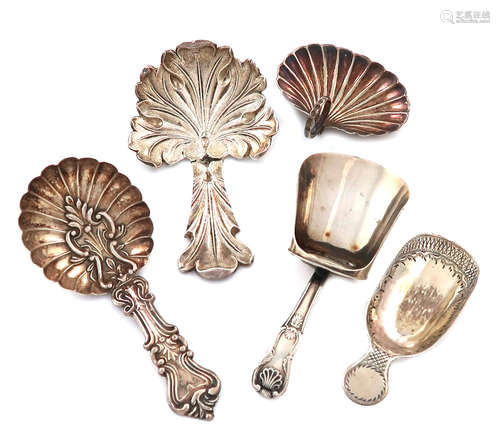 A collection of five antique silver caddy spoons, various dates and makers, including: a George