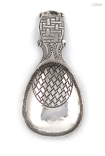 By Liberty and Co., an Arts and Crafts silver caddy spoon, Birmingham 1936, fig-shaped bowl, with