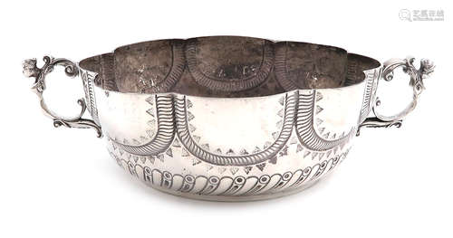 A two-handled silver bowl, by Henry Lambert, London 1912, lobed circular form, caryatid scroll