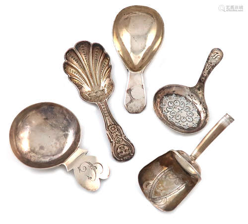 A collection of five antique silver caddy spoons, various dates and makers, including: a George