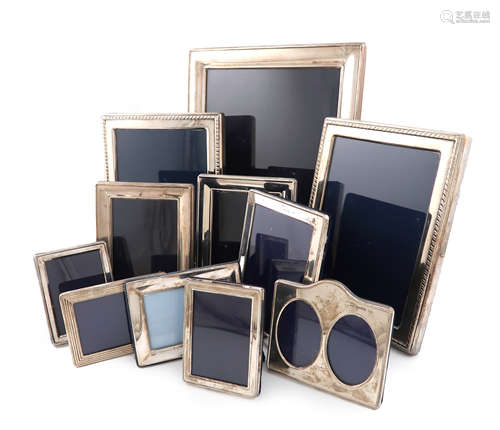 A collection of eleven silver photograph frames, various dates and makers, including: a large one of