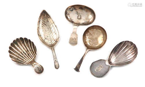 A collection of five antique silver caddy spoons, various dates and makers, including: a George