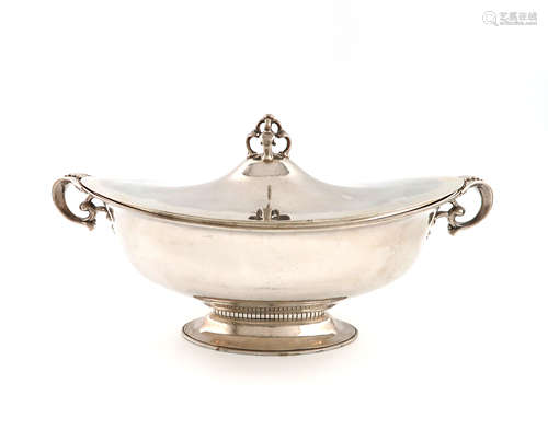 By Marius Hammer, a Norwegian silver two-handled tureen and cover, Bergen circa 1915, oval form,